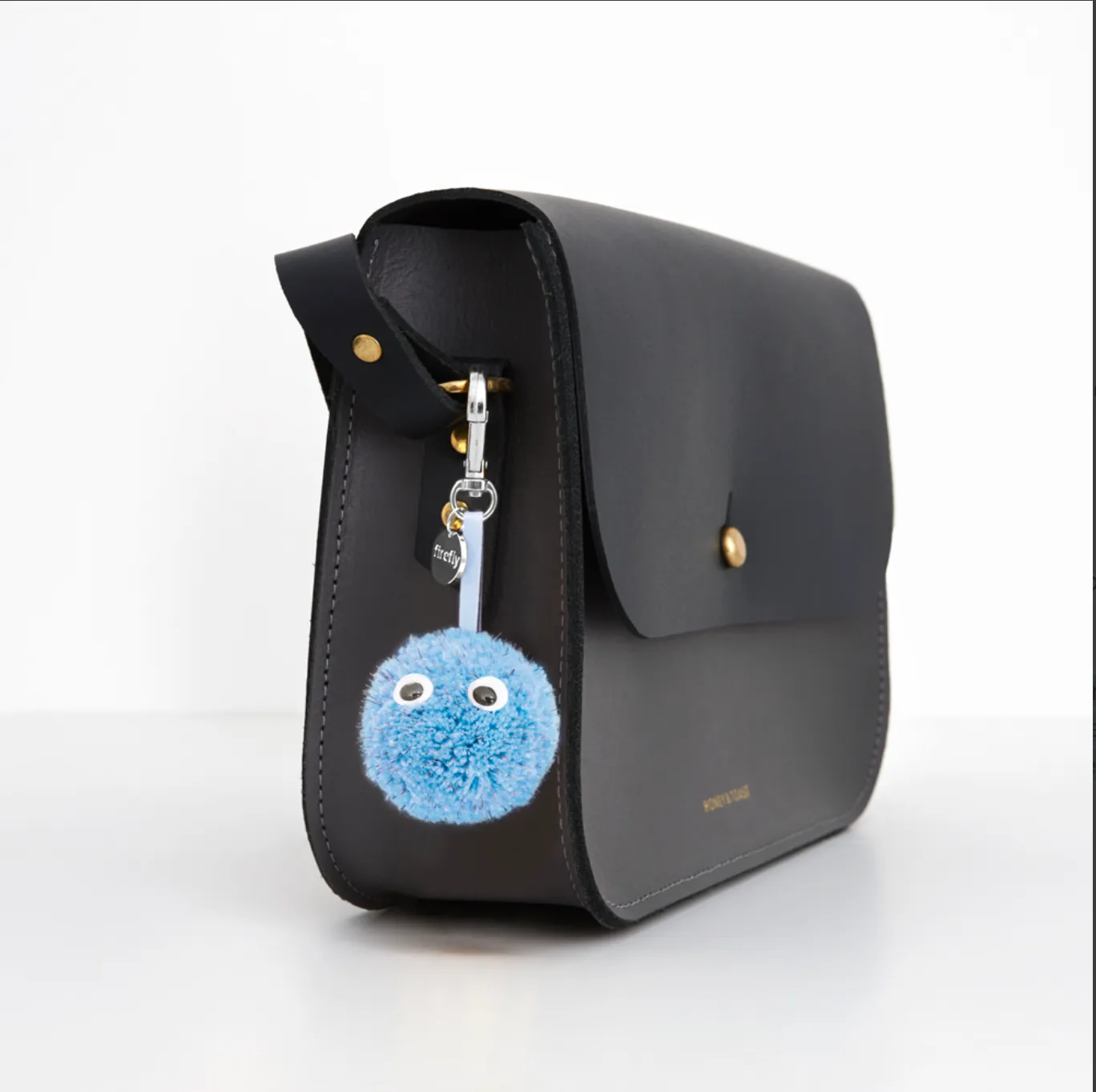 POM POM REFLECTOR CHARM - BABY BLUE